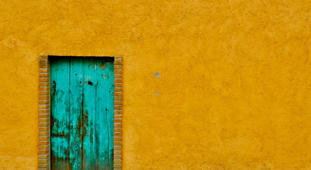 closed green wooden door