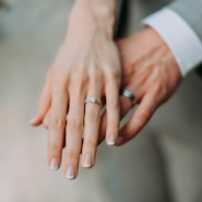 woman touch man's hand