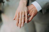 woman touch man's hand