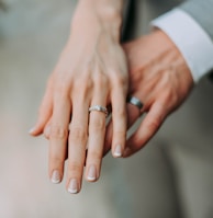 woman touch man's hand