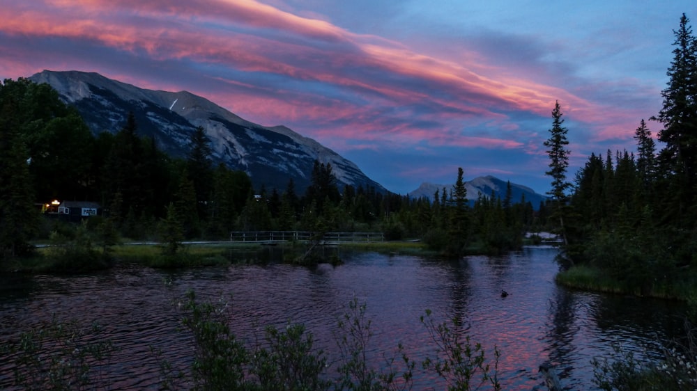 lagoon with snow-capped mountain background