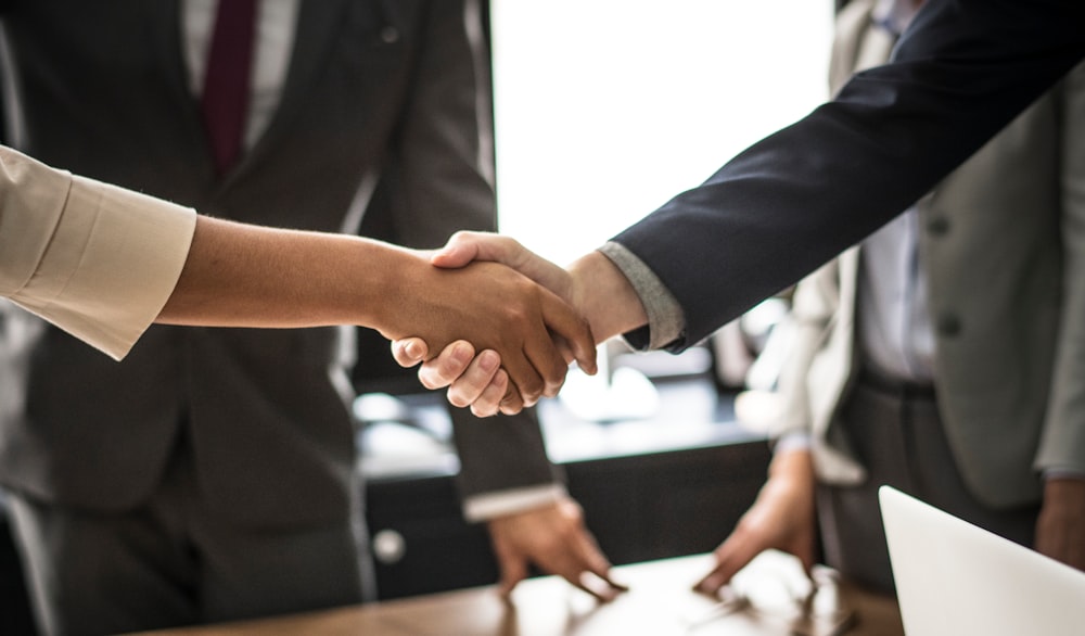 man and woman doing handshake