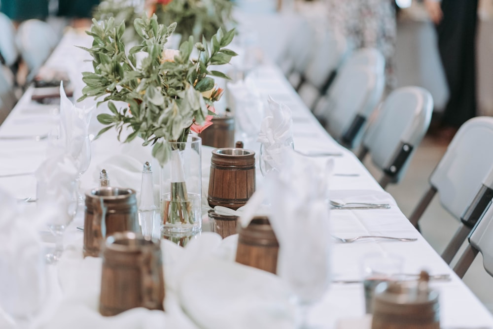 brown wooden containers on white table cloth