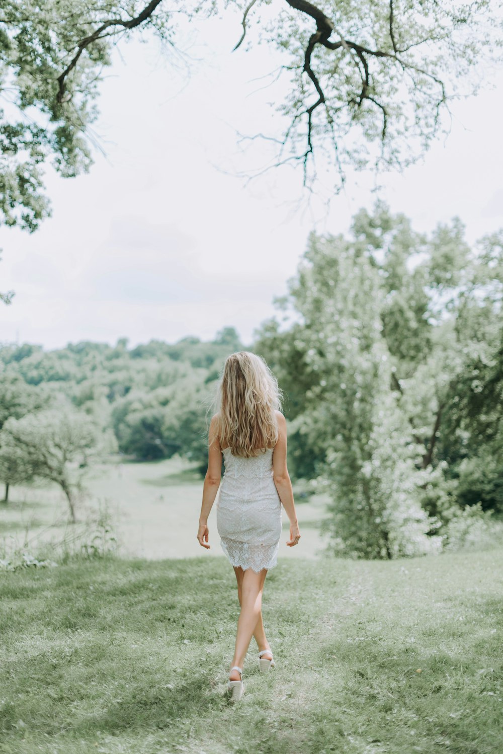 woman in grey dress walking