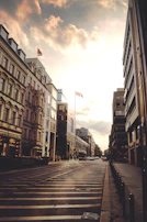 A candid travel photo showing a bustling street scene with warm golden light.