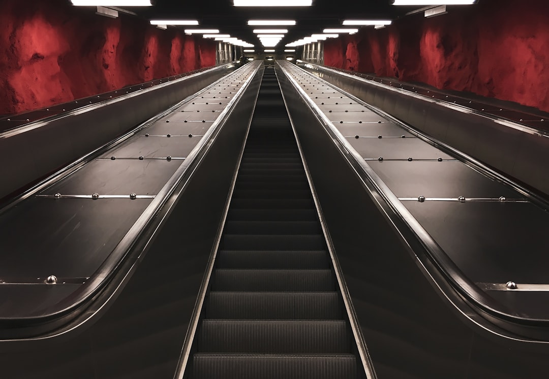 black escalator with no people