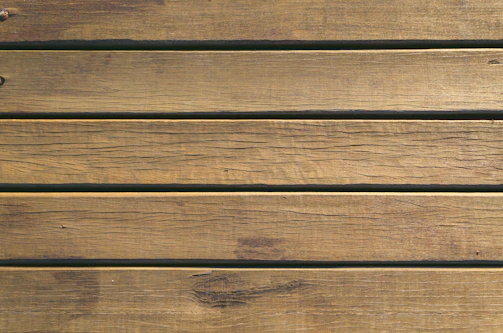 Rustic wooden-look tiles blending with farmhouse decor.