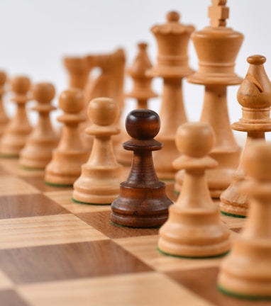 selective focus photography of chess pieces