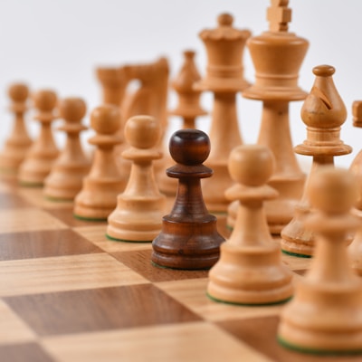 selective focus photography of chess pieces