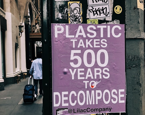 plastic takes 500 years to decompose poster on black surface