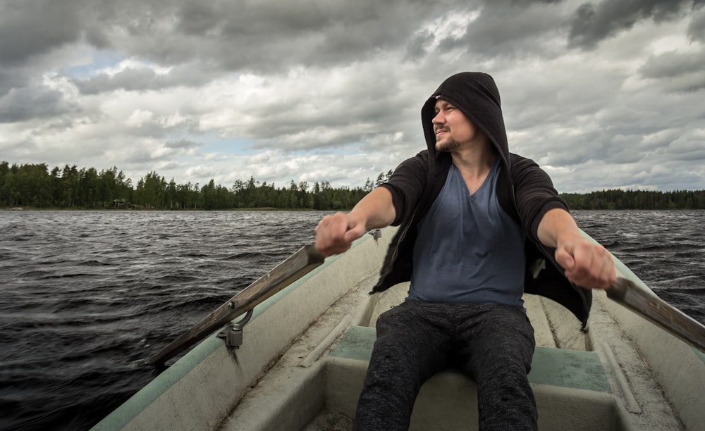 man rowing boat