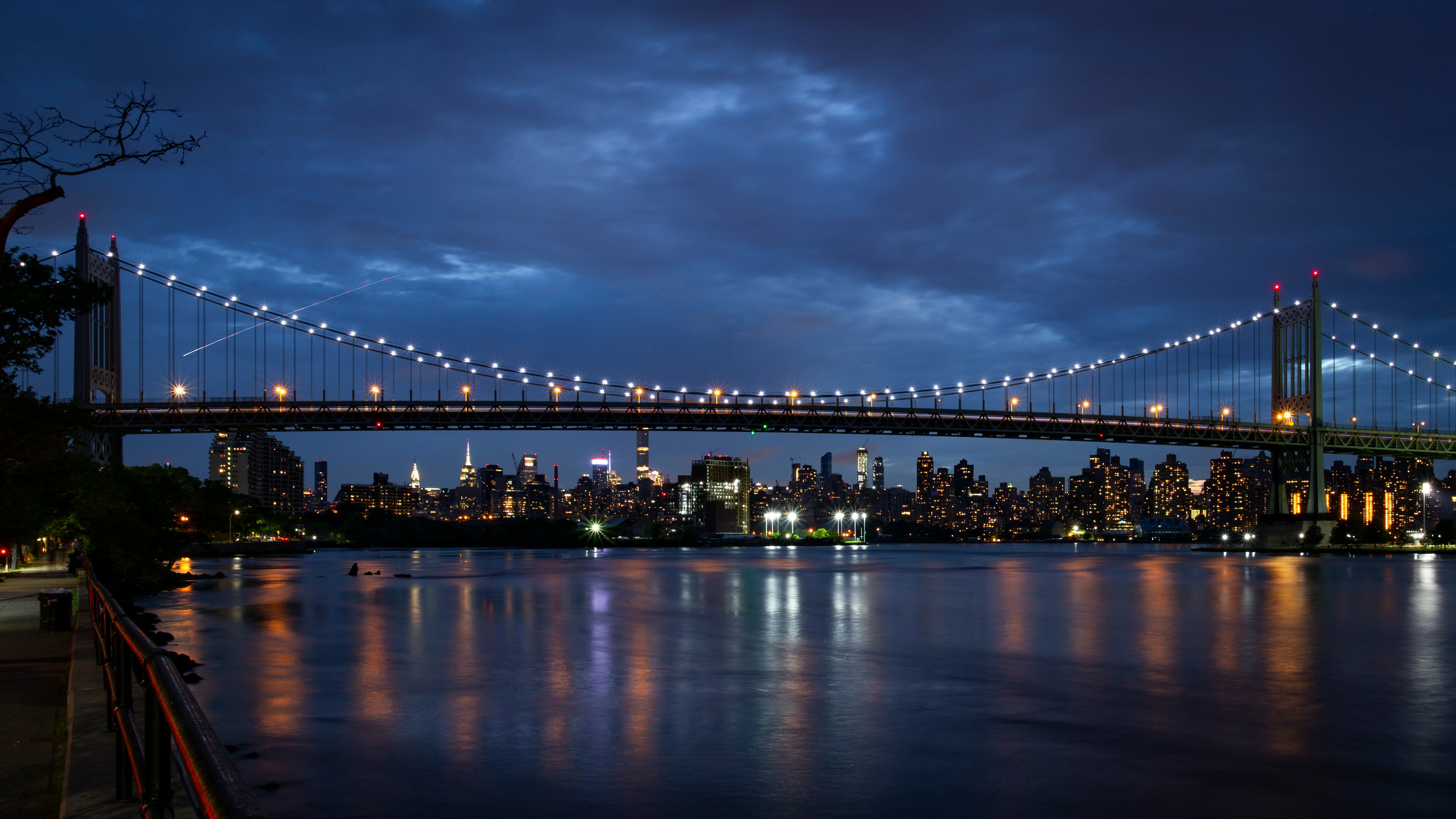lighted suspension bridge during nighttime