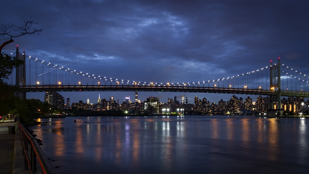 lighted suspension bridge during nighttime
