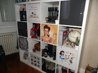 Shelves filled with Funko Pop boxes featuring characters from movies, games, and comics.