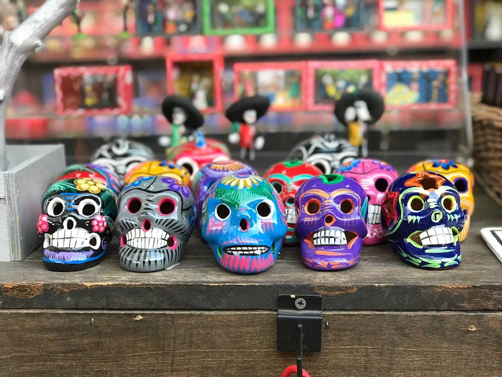 multi-colored sugar skull figurines