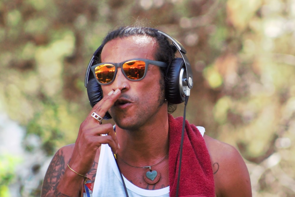 man wearing orange sunglasses during daytime