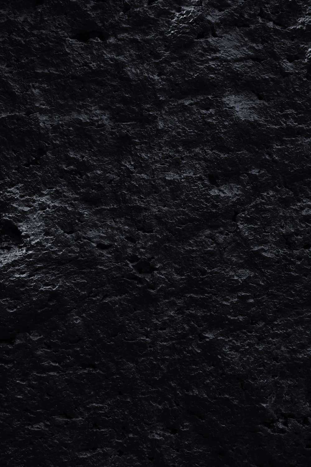 Close-up of rough black volcanic stone