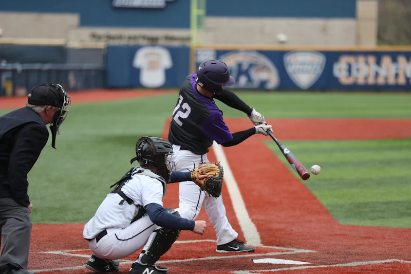 Youth baseball player at bat during training