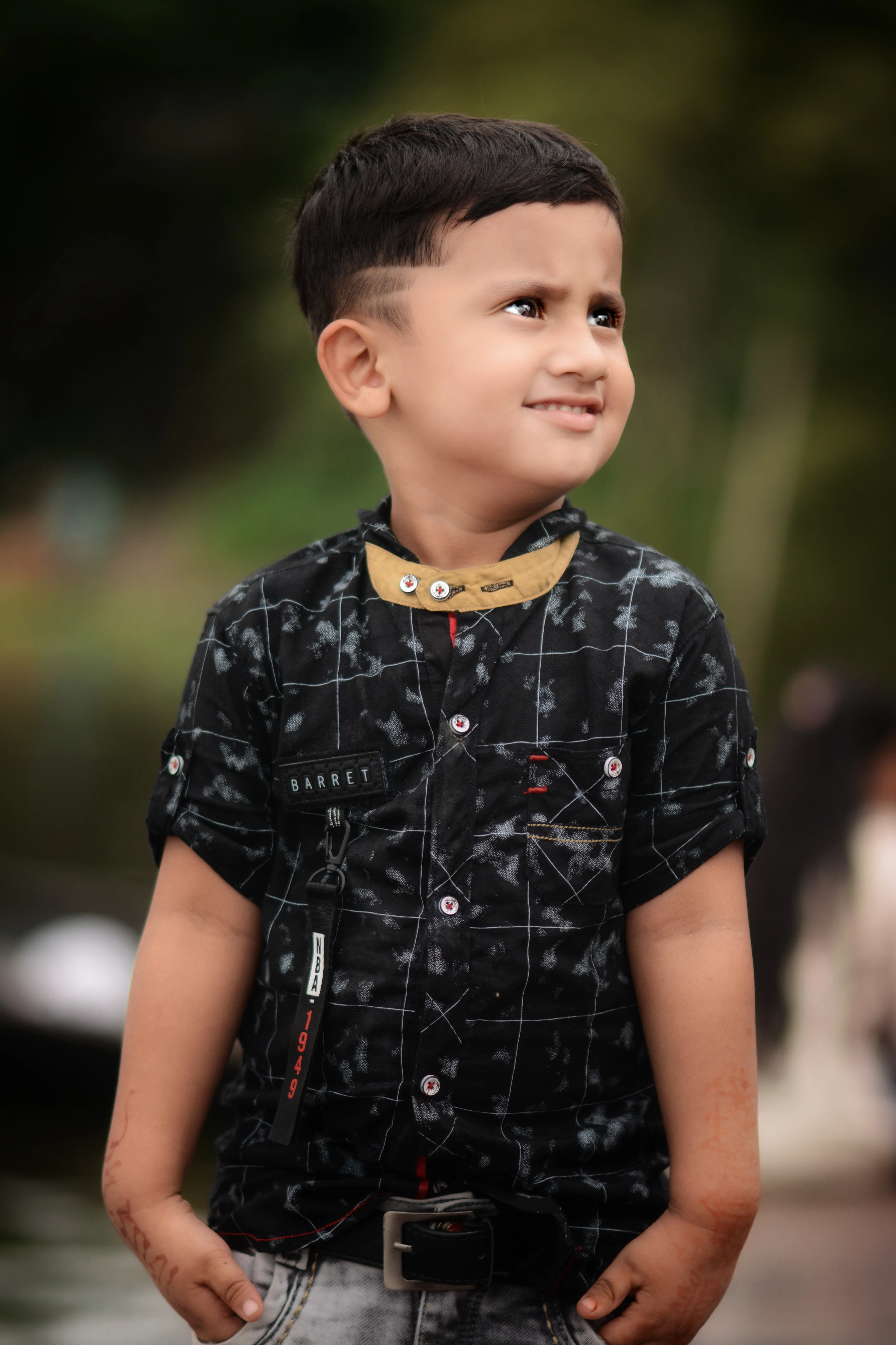 Boy in a black printed short-sleeve shirt