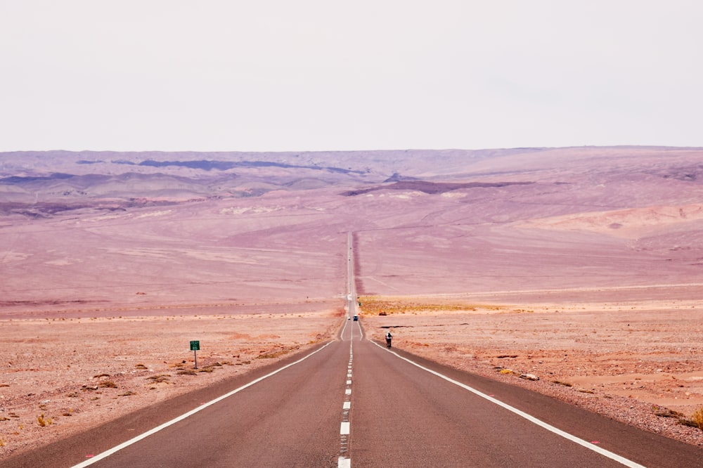 landscape photography of brown wide road