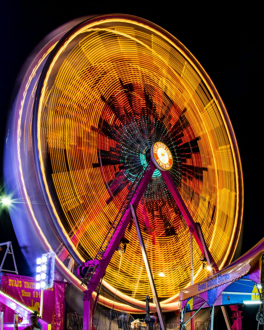 yellow and pink Ferris wheel