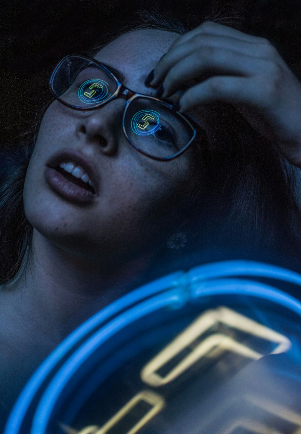 woman wearing black framed eyeglasses