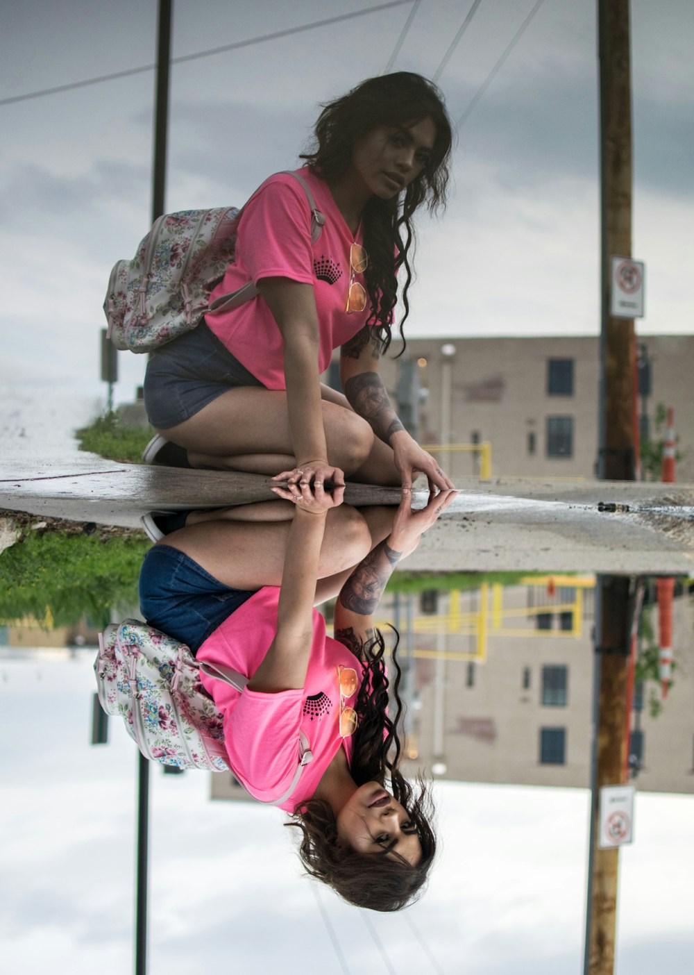 a reflection of a woman and a child in a mirror