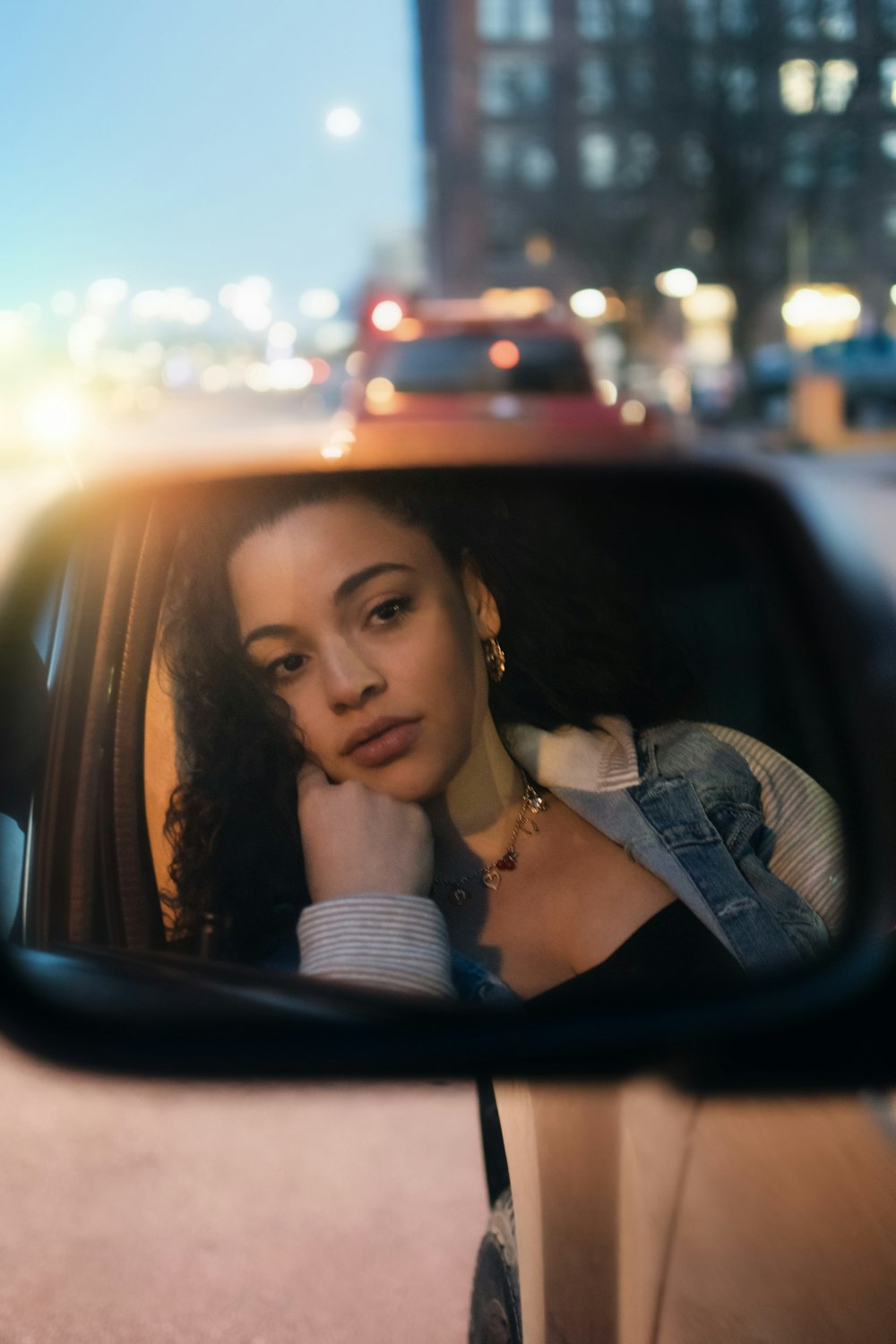 woman sitting in vehicle