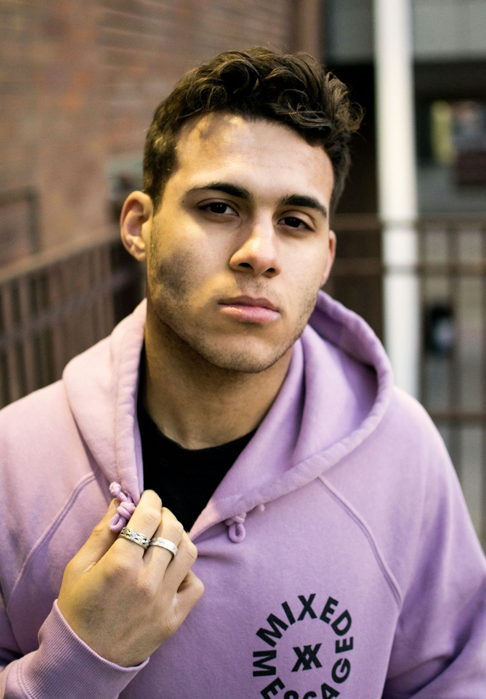 man in purple pullover hoodie