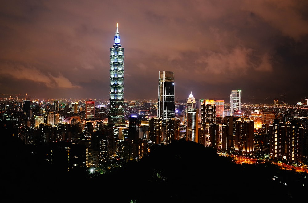 high angle photography of city lights and high-rise buildings during nighttime