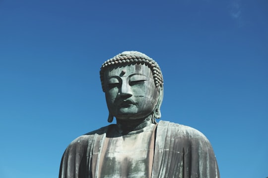 Gautama Buddha statue under clear blue sky in Kōtoku-in Japan