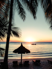 A serene beachfront villa in Los Cabos at sunset.