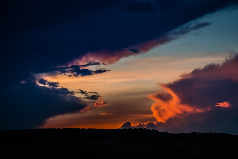 silhouette of mountain during golden hour