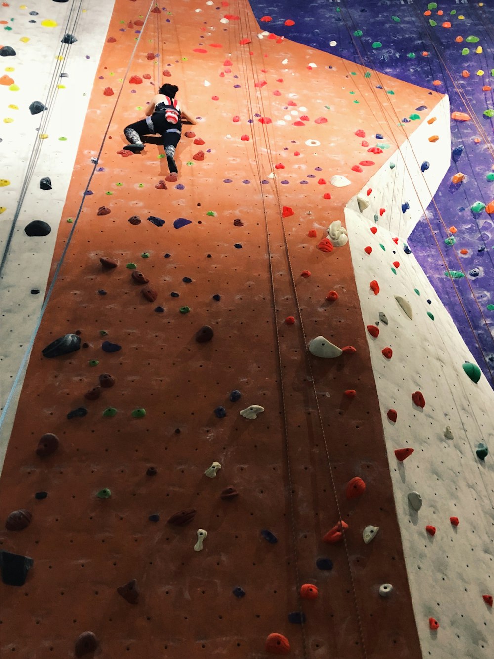 person wall climbing