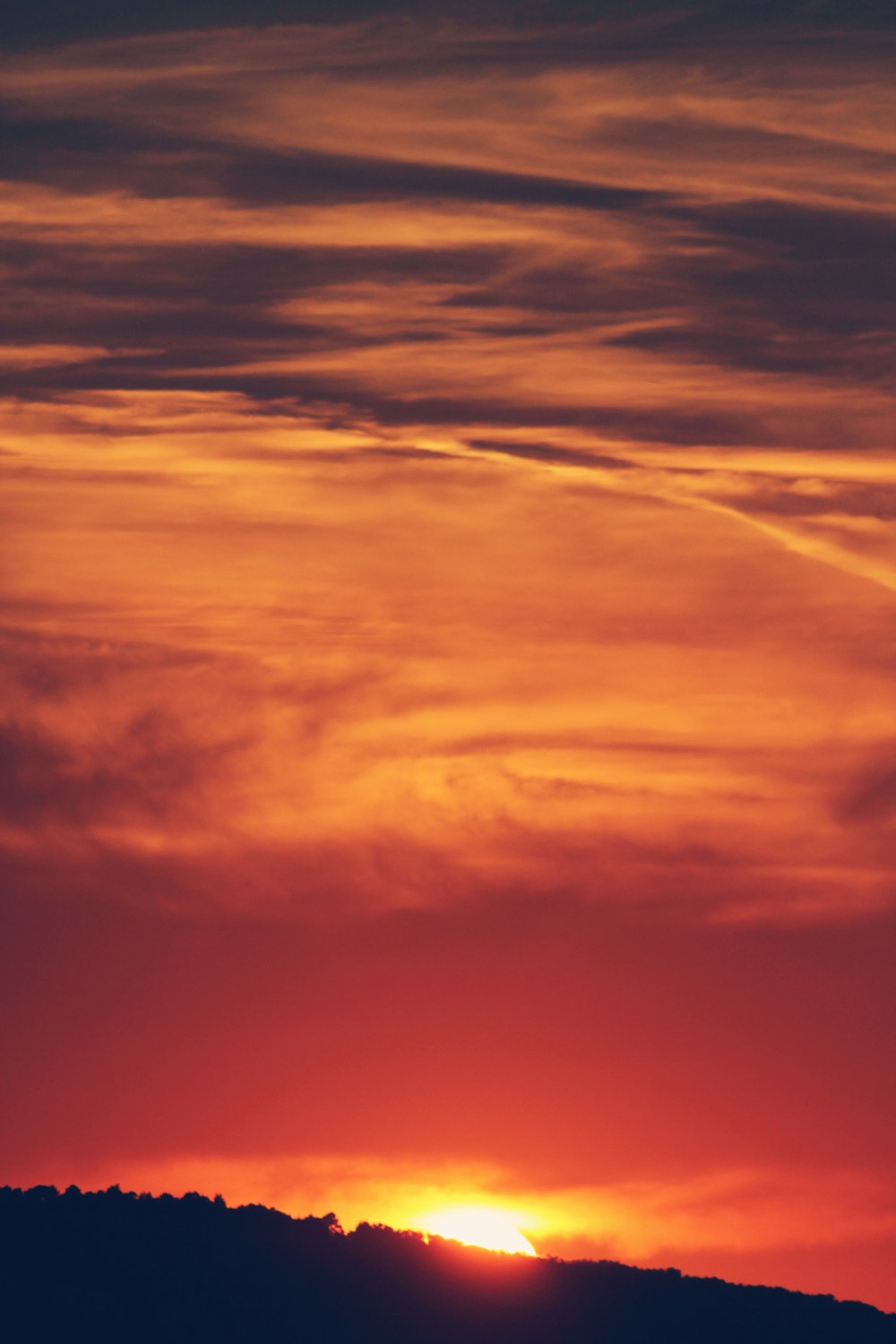 silhouette of mountain in golden hour background