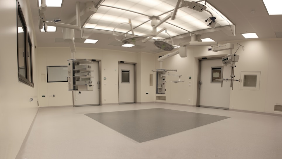 A modern surgical room equipped with advanced technology.