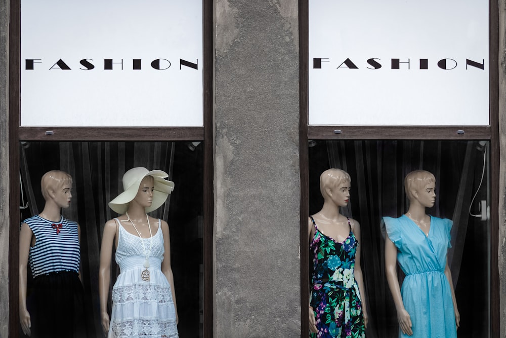 four women's assorted dresses