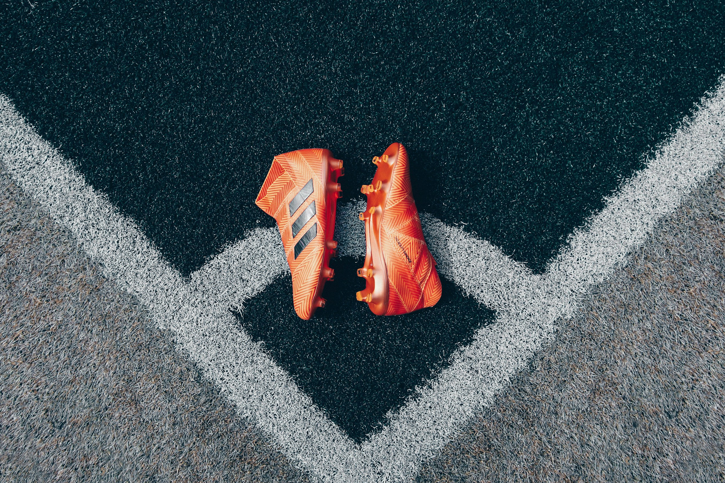 football boots pitch grass close up