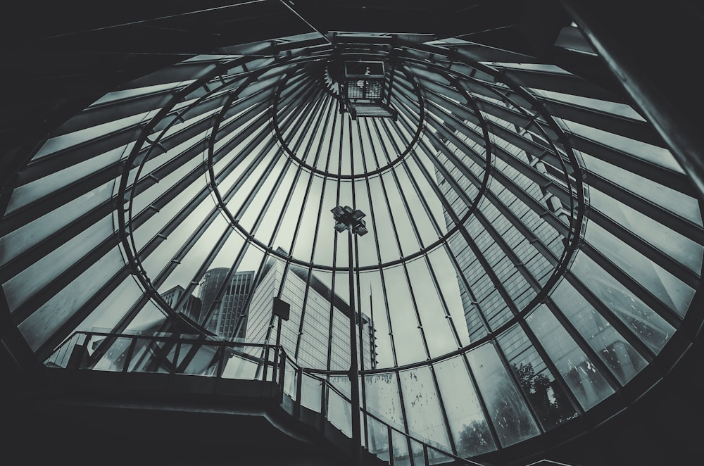 a view of a building through a glass dome