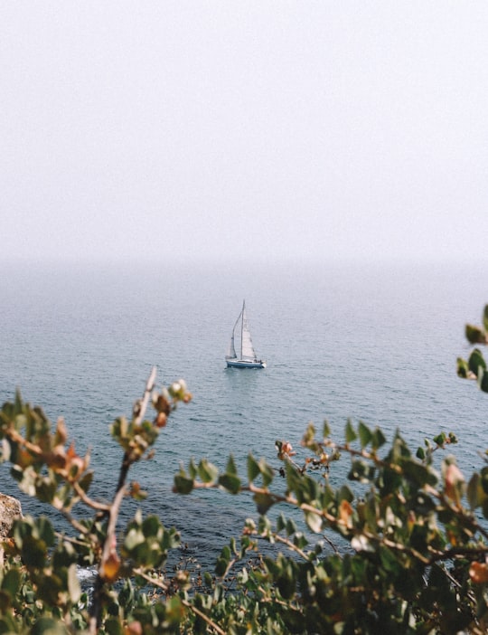 white sailing boat in Cascais Portugal