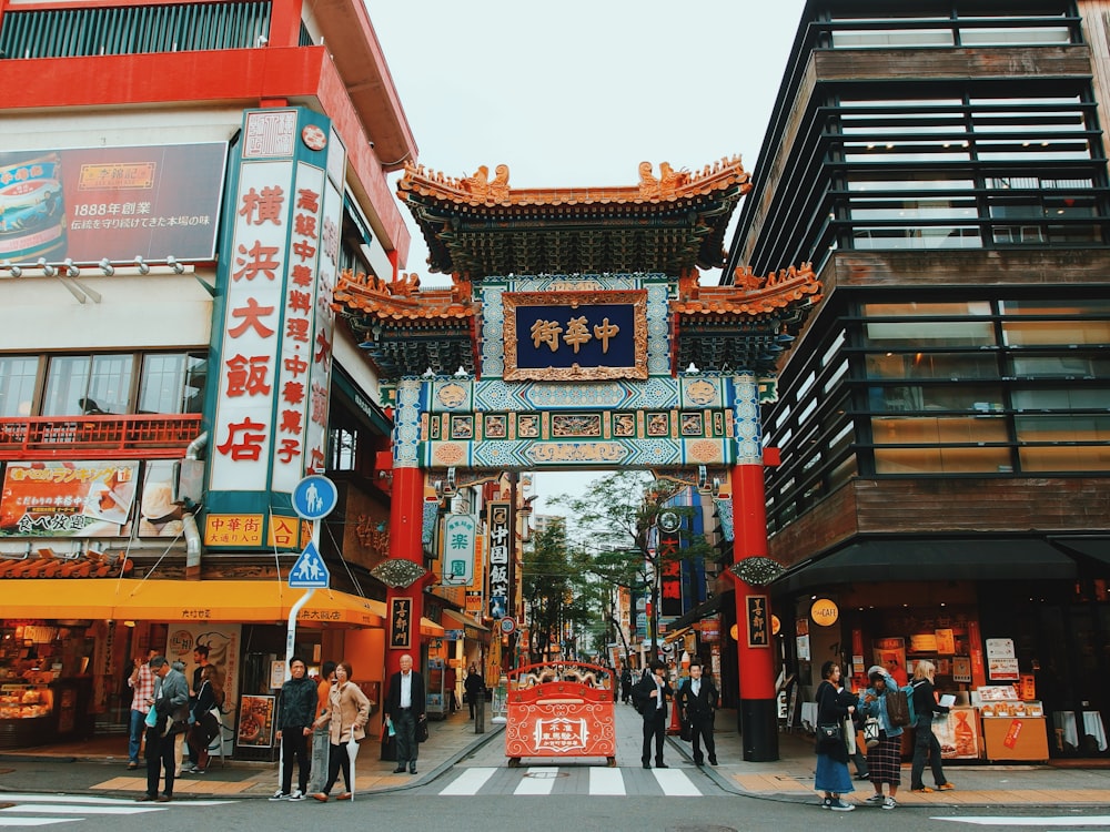 people walking in front of china town