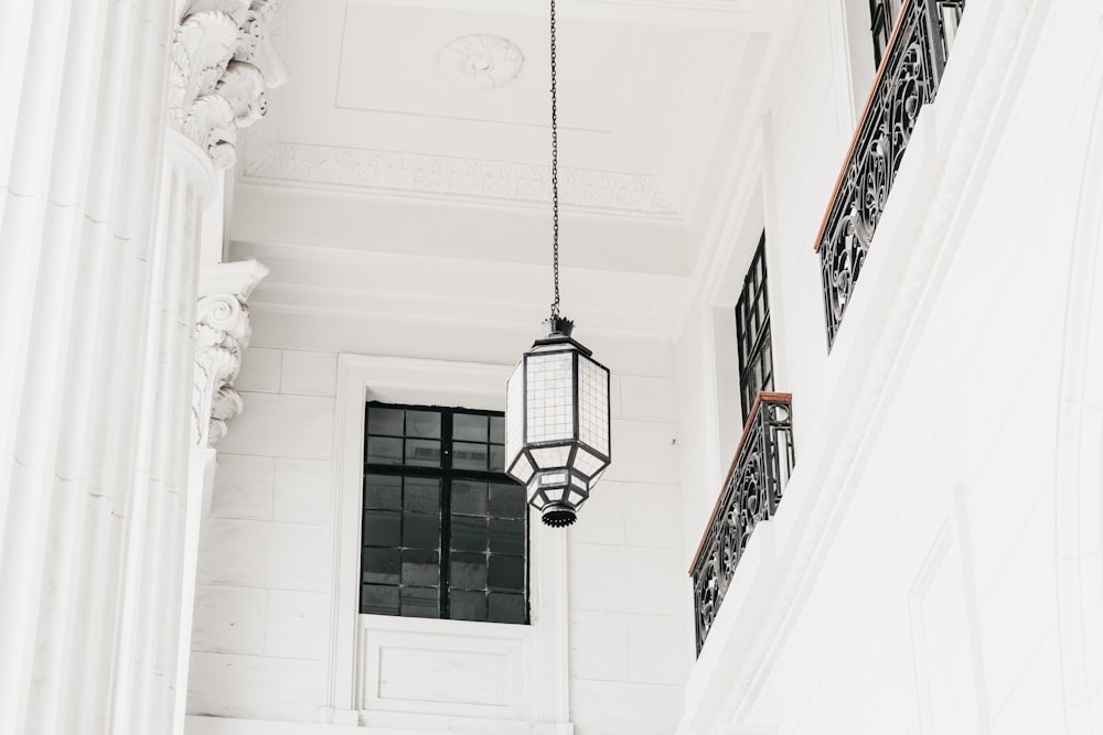 low-angle photo of black and white pendant lamp