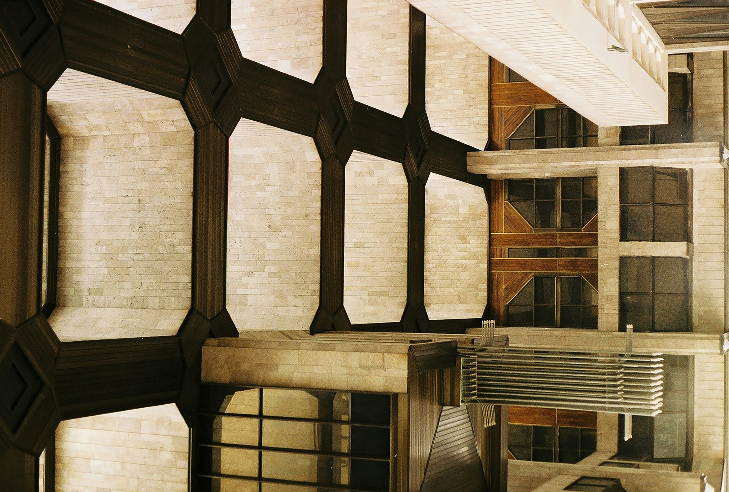 Image comparing a hard loft with exposed brick and beams and a soft loft with modern finishes and large windows - loft apartments near me