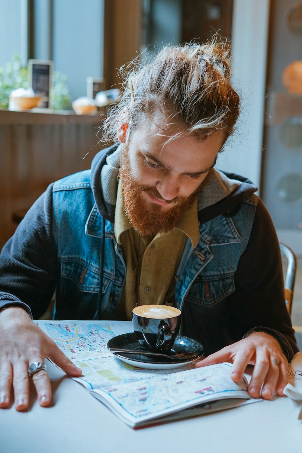 man looking at coffee