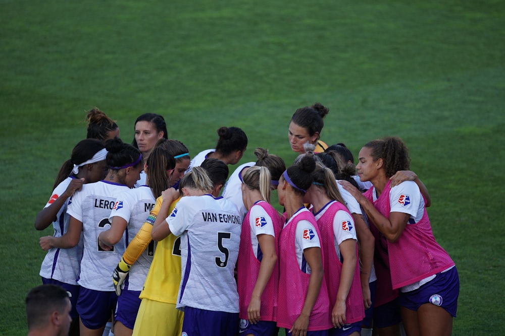 group of players on field during daytime