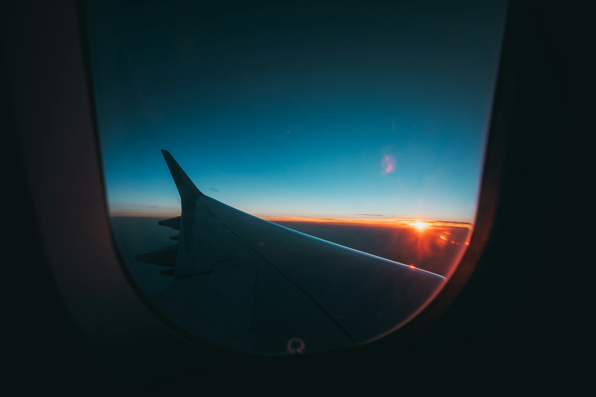 aircraft wingtip photography during golden hour