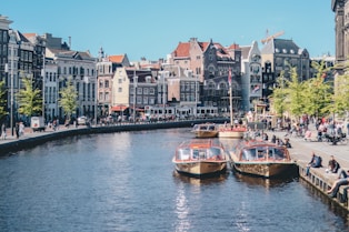 boats on the river near the building