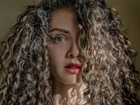 woman's face on focus photo