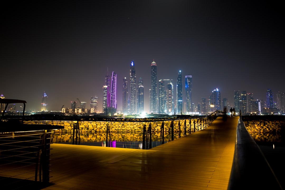 wooden dock near flower garden,