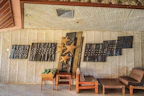 Elegant metal wall art with intricate patterns displayed in a cozy living room.